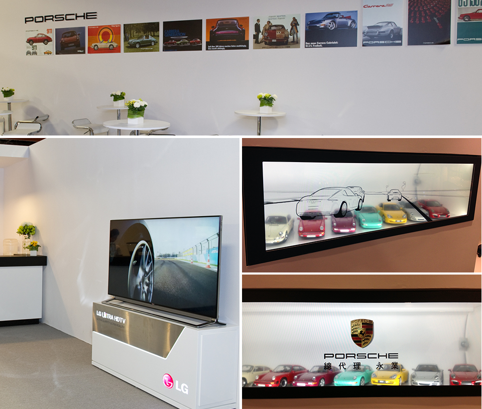 Vintage Porsche poster wall, lounge and a lit miniature diorama of the 911 lineage